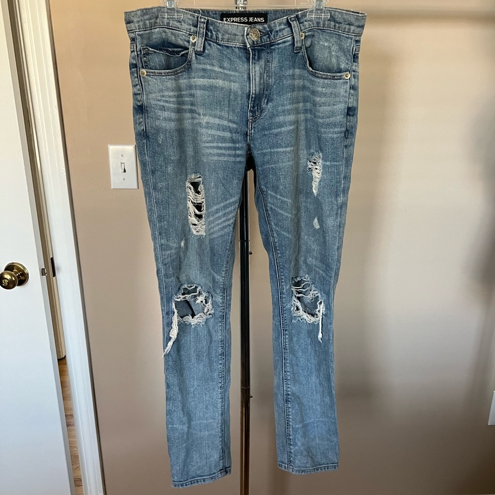 Mid rise ripped girlfriend jeans